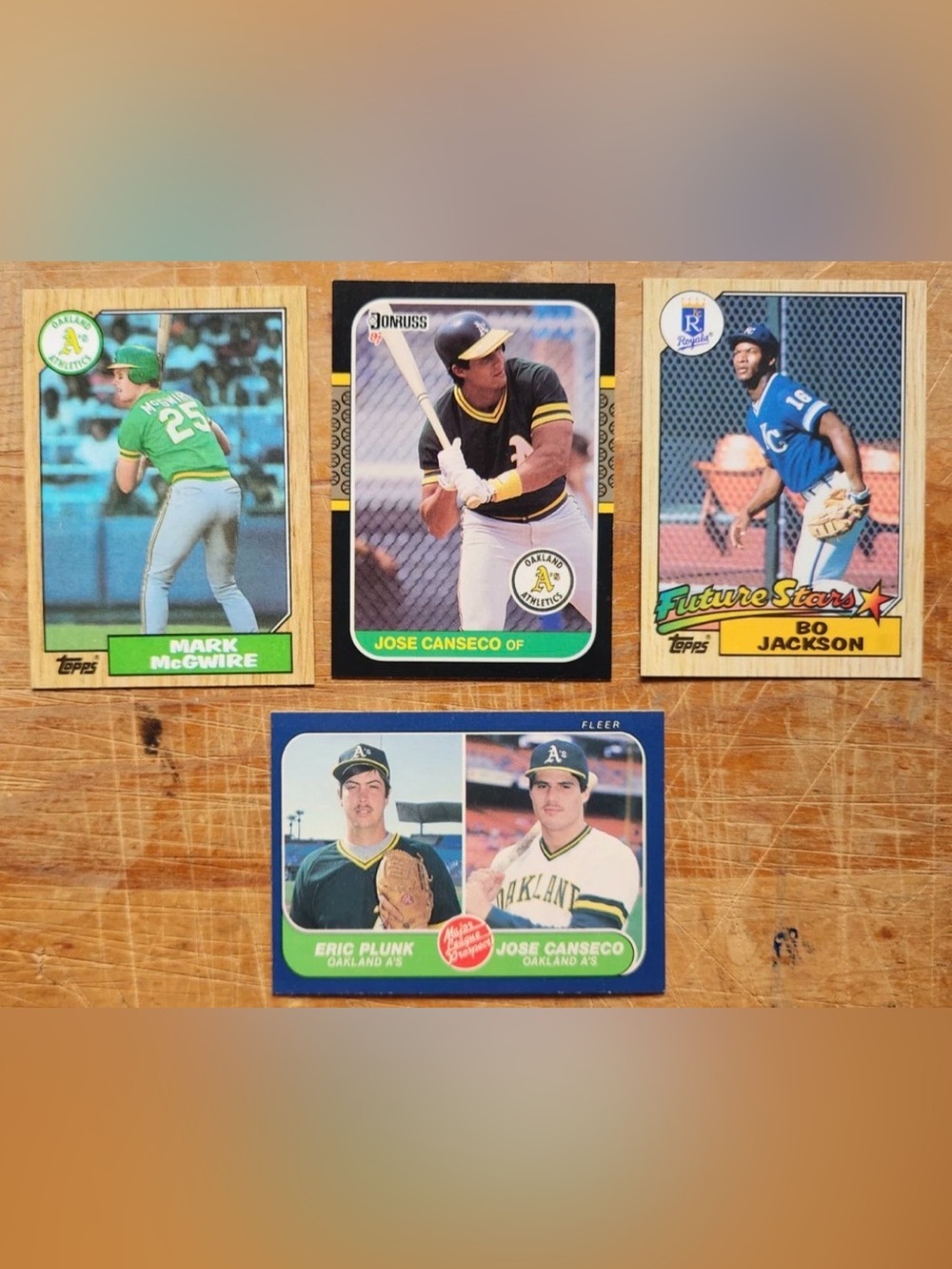 4 Rookie Cards in Excellent Condition
86 Canseco (rare)87 McGwire, 87 Bo Jackson